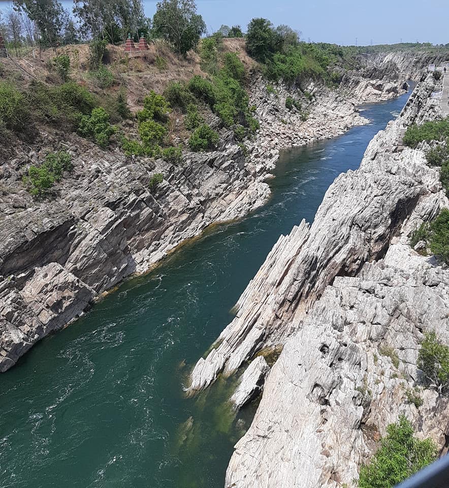 Marble Rocks and River in Bhedaghat. India Stock Photo by crshelare