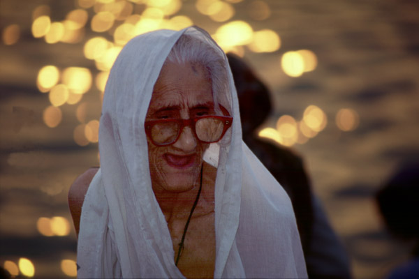 Image result for widow taking bath in ganges